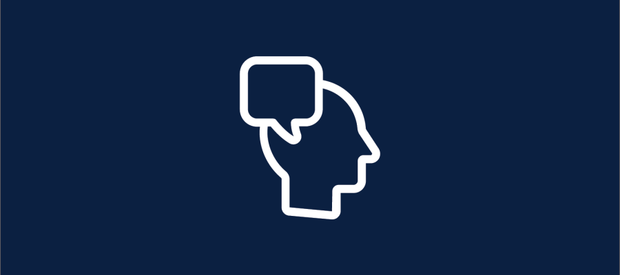 A white graphic outline of a head with a speech bubble on a navy background.