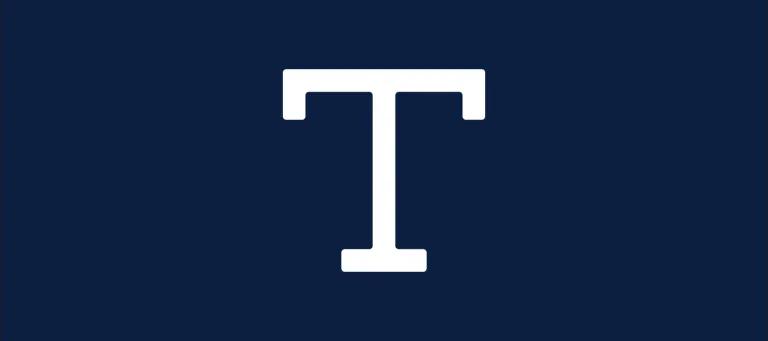 Navy background with white medium-weight letter 'T'.