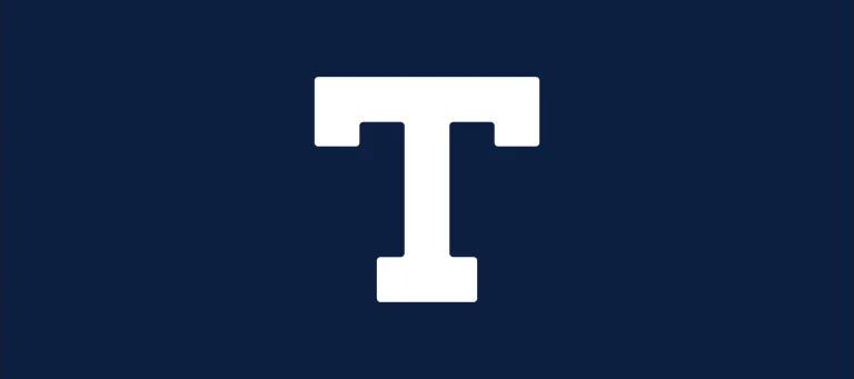 Navy background with a white heavy-weight letter 'T'