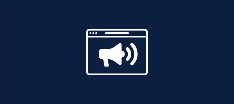 Navy background with a white graphic of a webpage outline and a white loudhaler in the centre.